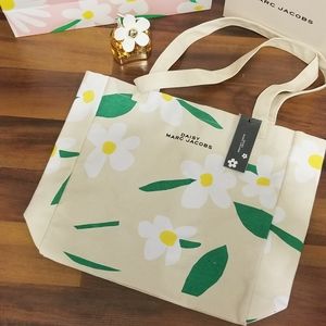 Marc Jacobs Daisy Canvas Tote NEW TAGS. WILL RELIST. ONCE I GET FROM STORAGE